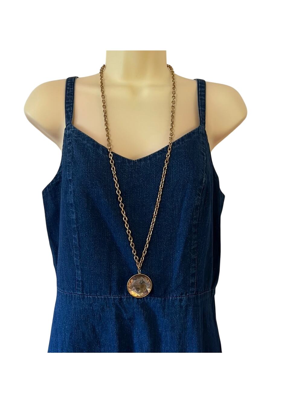 Gold tone chain necklace with round crystal pendant